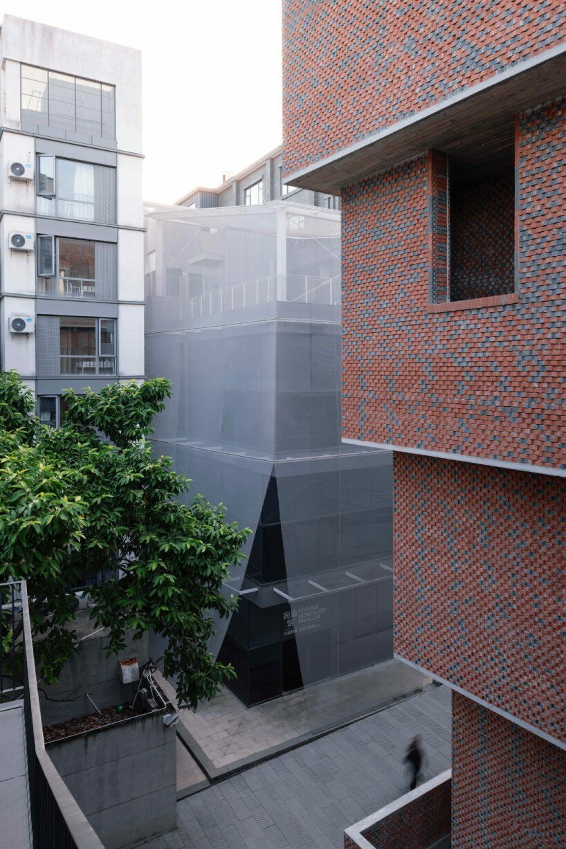 metal mesh facade veils TAO's transient in-between pavilion in nantou ancient town