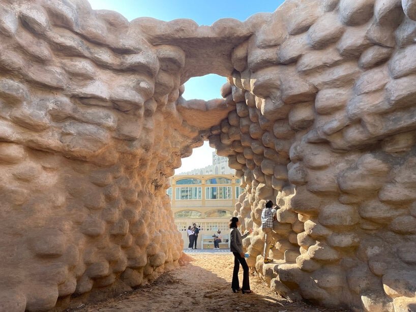 wallmakers uses 1,425 discarded tires coated in desert sand for sharjah triennial pavilion 