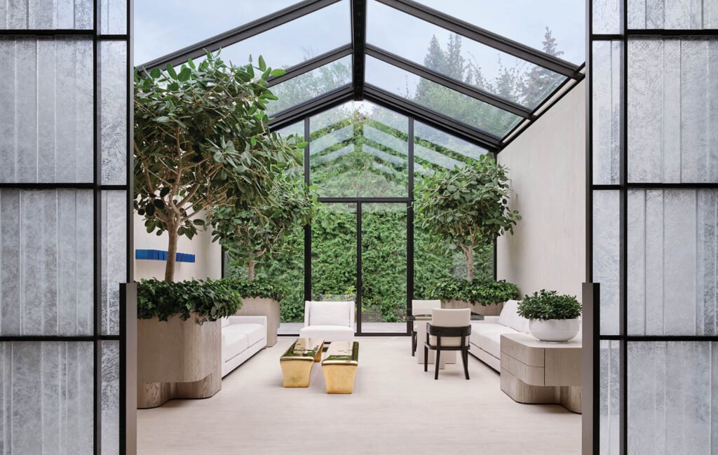 a Toronto home's atrium filled with leafy green plants