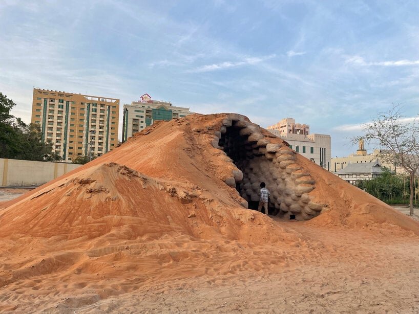 wallmakers uses 1,425 discarded tires coated in desert sand for sharjah triennial pavilion 