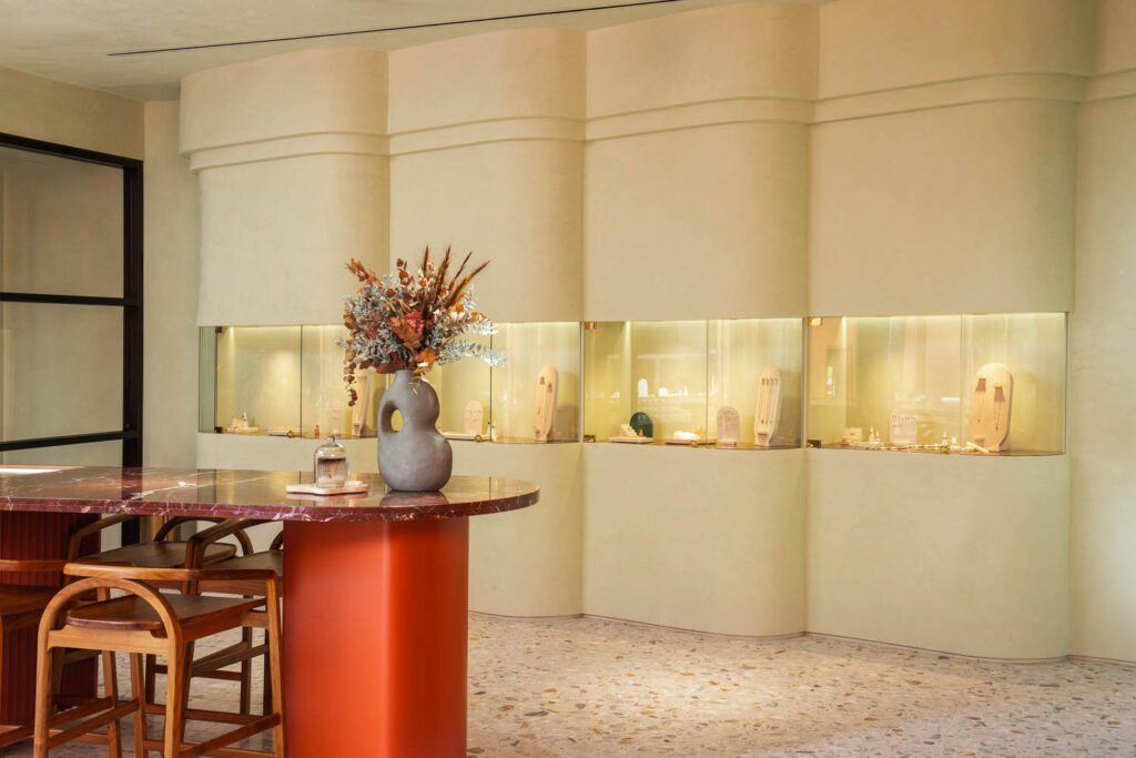 The citron scalloped wall incorporates the main display vitrines.