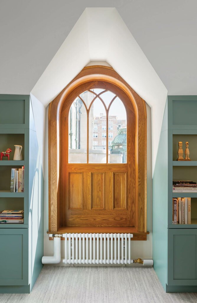 Restored wooden arch top window in museum in historic mansion