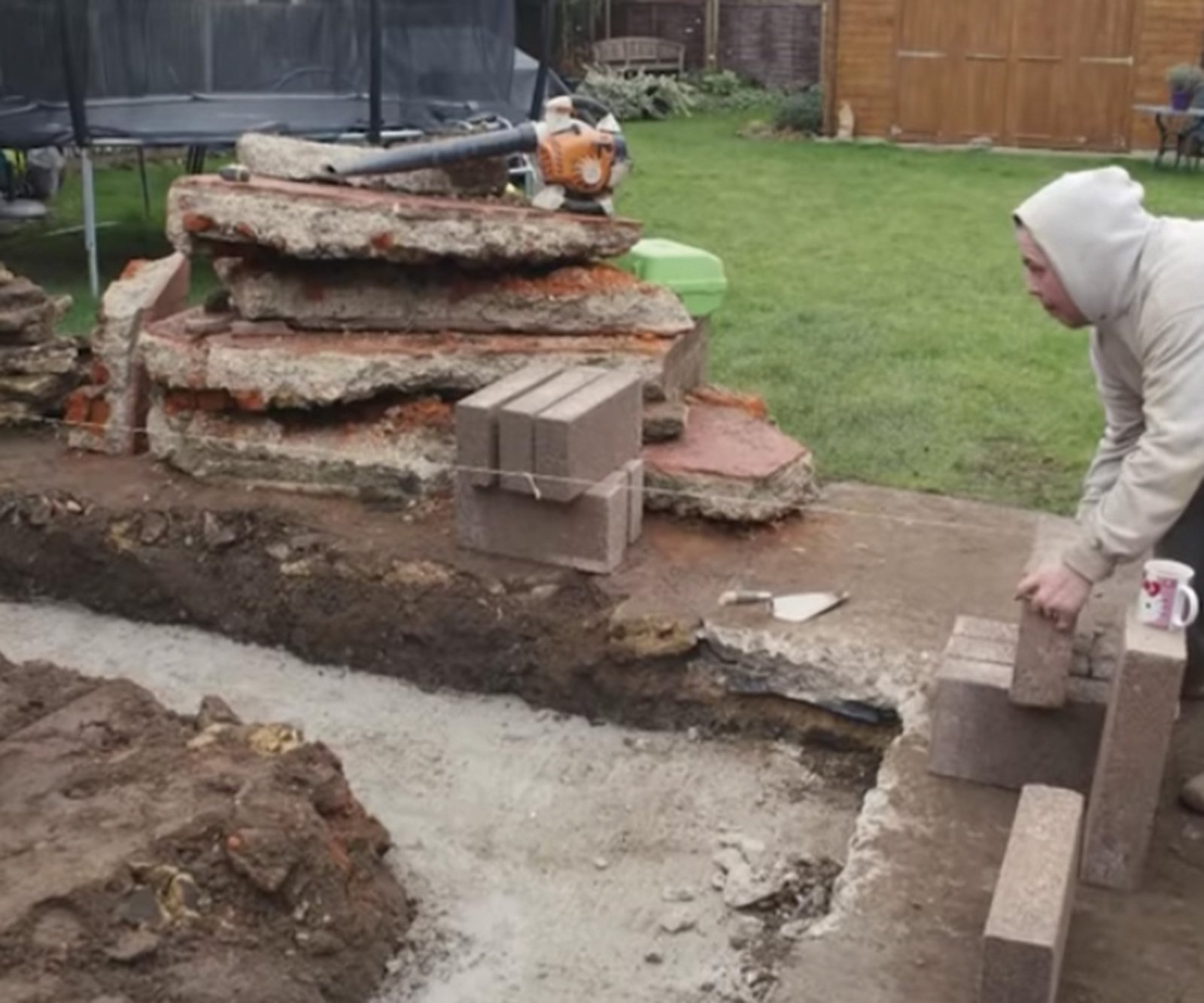 builder pouring foundations