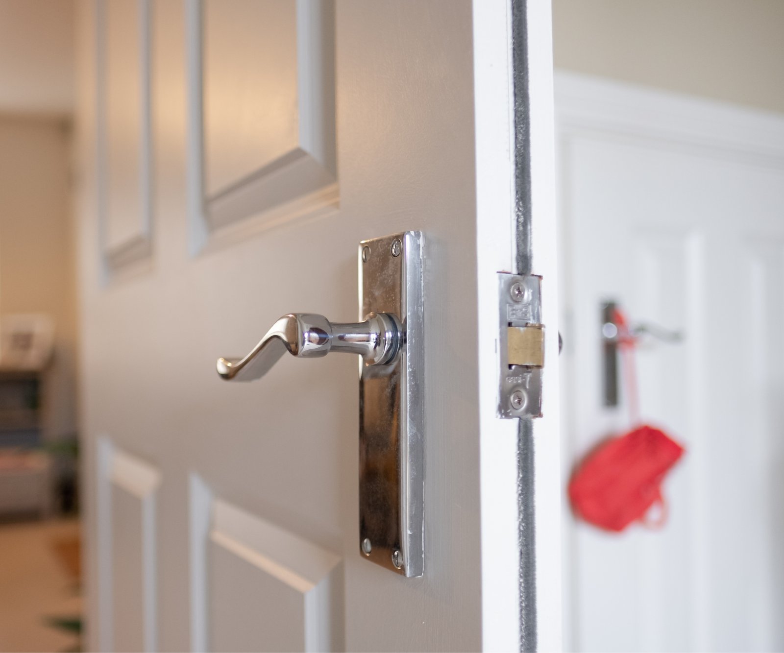 close up shot of side of fire door and handle