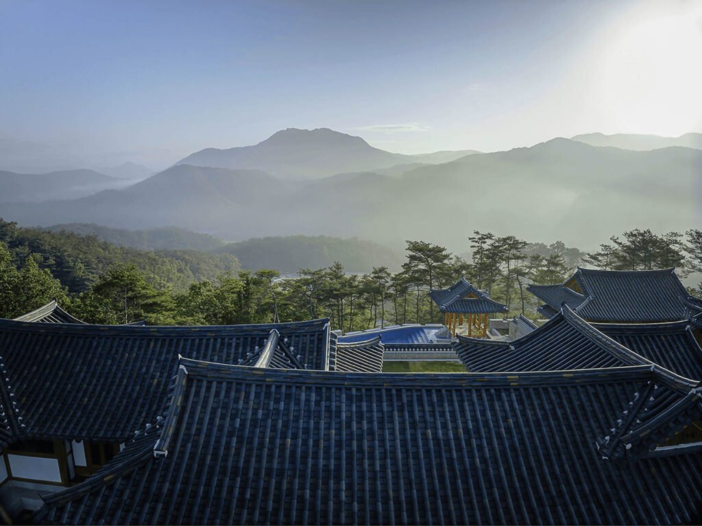 a view from the roof of the Hanok Heritage House overlooking mountains